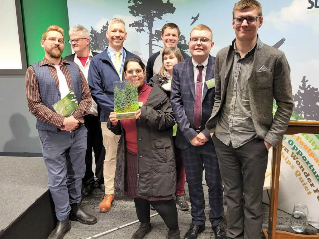 farm Helpers and team members at Depden Care Farm holding an award
