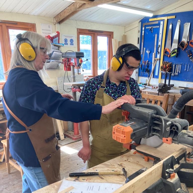 farm helper and team member in the workshop
